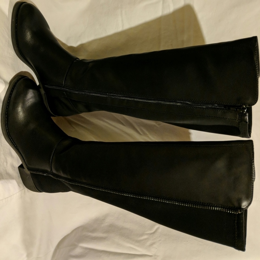 Never been used faux leather boots.